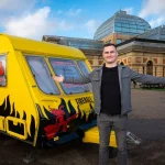 Un fan de darts obtient un poste exclusif lors du Championnat du Monde