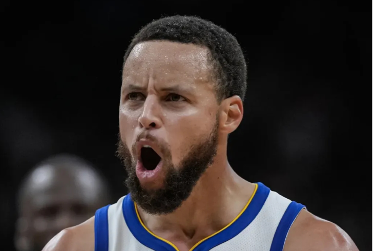 Steph Curry porte les Nike Book 1 de Devin Booker