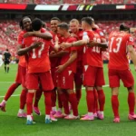 Rubén Vargas congratulé par ses coéquipiers après son ouverture du score pour la Suisse face au Canada à Vancouver, 24 juin 2026 — AP / The Canadian Press
